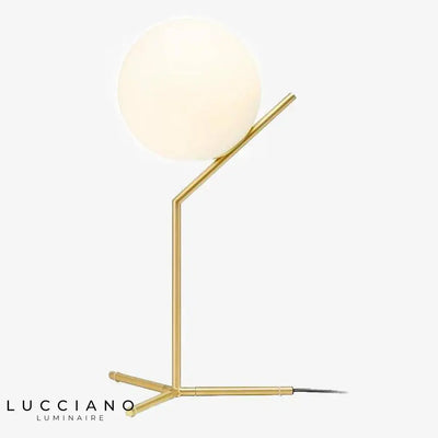 Gold design lamp with glass globe