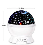Veilleuse projecteur LED rotatif produisant un ciel étoilé