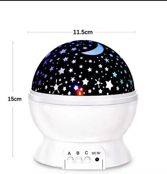 Veilleuse projecteur LED rotatif produisant un ciel étoilé