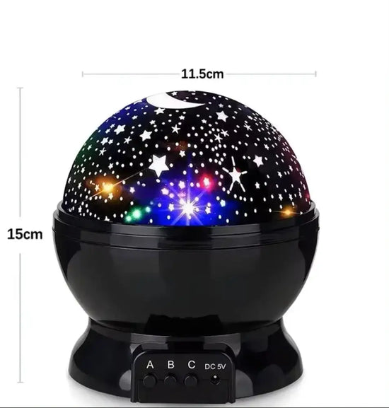 Veilleuse projecteur LED rotatif produisant un ciel étoilé