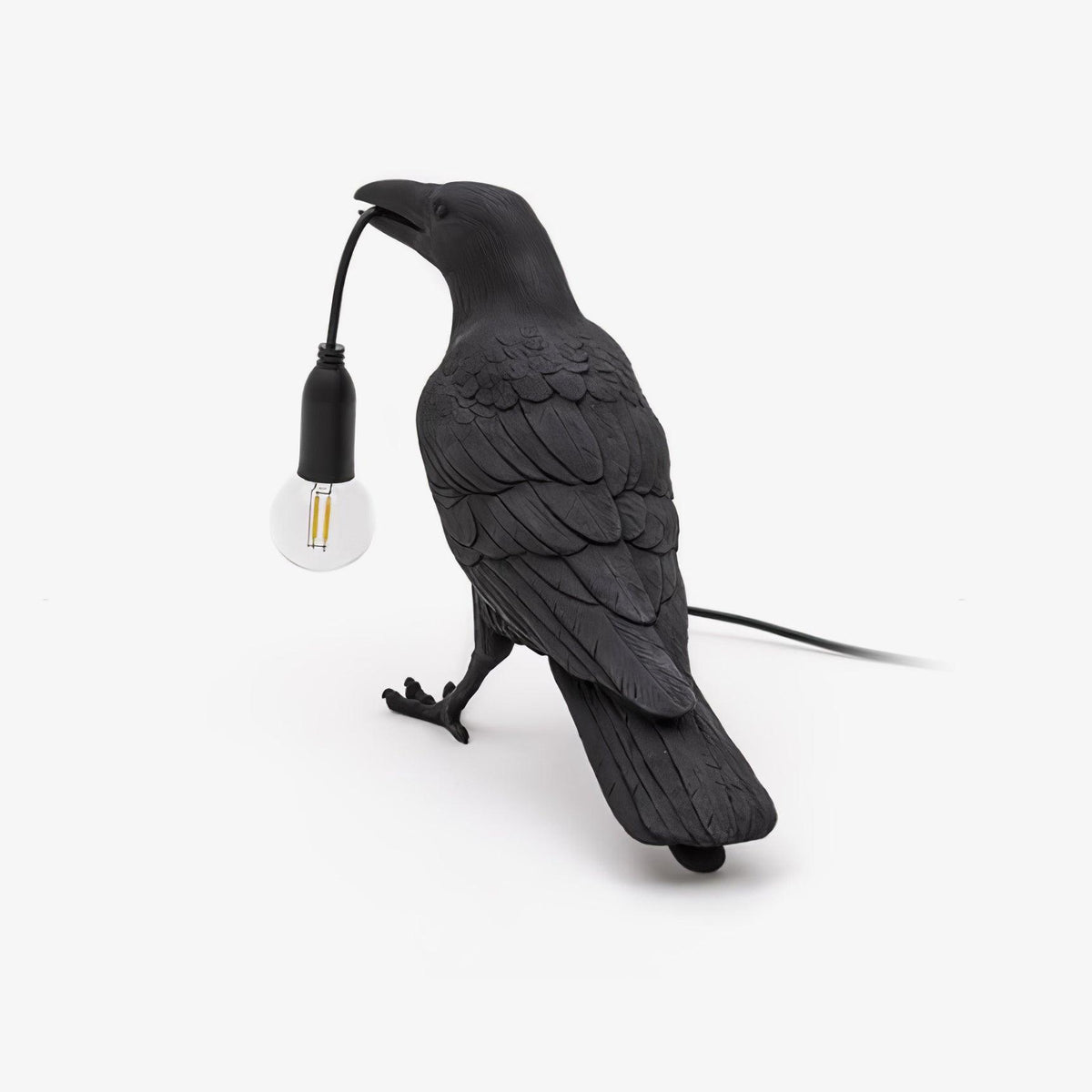 Lampe de table créative Raven en résine avec LED, une lumière