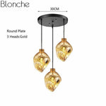 Suspension Led Verre Coloré Déformé Doré - 3 Lampes Base Rond Luminaire Doré