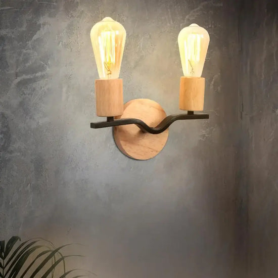Voici La Transformation Du Titre En Respectant Vos Consignes: Applique Murale Deux Têtes